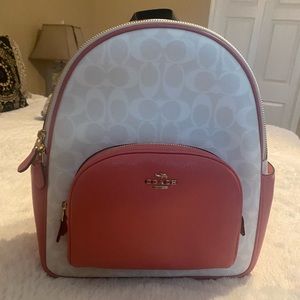 Beautiful white and pink Coach backpack